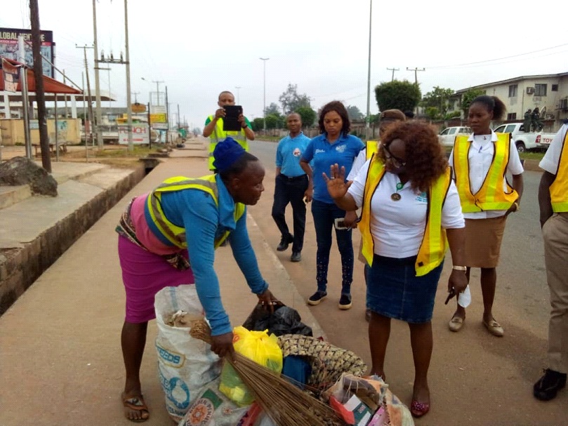 General Manager, Ondo State Waste Management Authority, Mrs Ayo Adeyemo (Front) and other sanitation officers, while monitoring the July edition of the Environmental Sanitation exercise in Akure                    Photo: Stephen Olajide