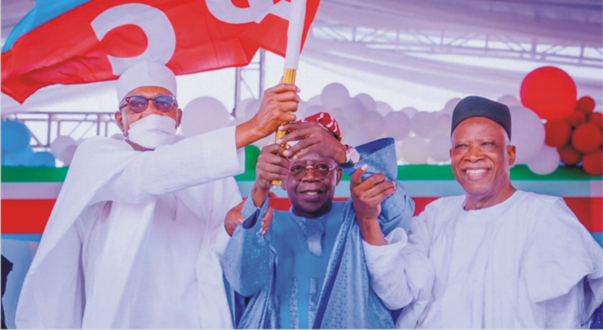 From left: President Muhammadu Buhari, presenting the All Progressives Congress (APC) flag, to the party's Presidential candidate, Asiwaju Bola Tinubu, while its National Chairman, Sen. Adamu Abdullahi watches, shortly after the party's primary election held in Abuja
