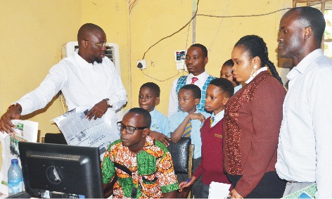 Pupils  and staff of Watersprings Int’l School, Akure being tutored on news gathering and production by Mr. Saheed Ibrahim (L) during an excursion to Owena Press Ltd.                                    PHOTO:  Stephen Olajide