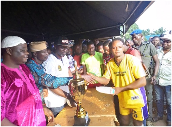 Winners of 4th Akogun Football Competition receiving their Trophy