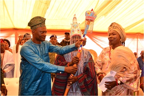 From left: Ondo State Attorney General and Commissioner for Justice, Charles Titiloye presenting Staff of Office to Aragberi Olanieji Agbangbalogun 1 of Ijoka kingdom, Oba Ejide Oluwalade and his daughter, Princess Olufunke  Alomaja Oluwalade during the ceremony on Wednesday in Akure         Photo: Ayodele Suberu