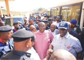 Minister of State for Transportation, Prince Ademola Adegoroye (R), Managing Director, Nigeria Railway Corporation (NRC), Fidet Okhiria (2ndR) and others, during the Minister's assessment visit to Tom Ikimi Train station in Igueben, Edo State, where some passengers were kidnapped last weekend