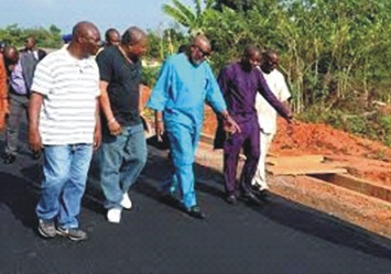 Governor Akeredolu inspecting road project in Akure