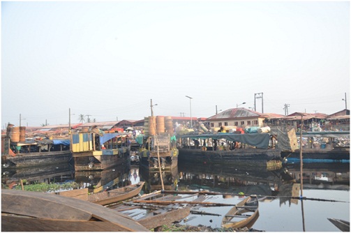 Years ago, at least a hundred boats visited the Igbokoda International Market during market days, but when The Hope came to town on the market day on December 30,  these were the few boats available. Photo: Eddie Agofure.