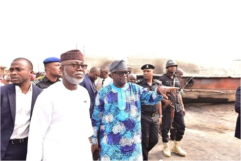 Ondo State Deputy Governor, Mr Lucky Aiyedatiwa (2ndL), being conducted round scene of the incident by Chairman, Idanre Local Government, Prince Kayode Aroloye  (M), while others watch