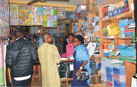 Parents shopping for textbooks at a bookshop