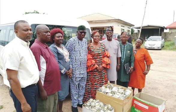 Ondo State Commissioner for Health, Dr Banji Awolowo Ajaka (4thL), President of the association, Dr Yemi Mahmud (4thR) with other members, during the distribution of the rat baits