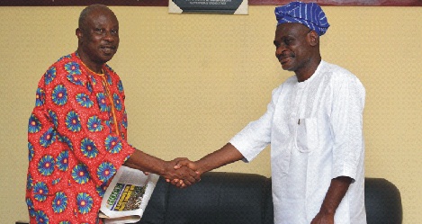 From left: Chairman/Editor -In -Chief of Owena Press Limited, Sir Ademola Adetula, exchanging greetings with State Chairman of NIESV, Mr.Oloruntoba ldris, during the visit…yesterday    		Photo: Stephen Olajide