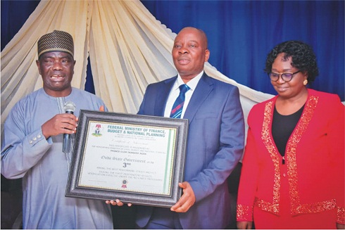 From left: Chairman, Federal CARES Technical Committee (FCTC), Rev. Aso Vakporaye, Ondo State Commissioner for Economic Planning and Budget, Pastor Emmanuel Igbasan, and the State Accountant-General, Mrs. Toyin Oni, during the presentation of the award                                                       Photo: Peter Oluwadare