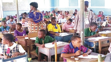 Permanent Secretary, Ondo State Ministry of Education, Science and Technology, Mrs Fọláṣadé Adegoke assessing students during the examination into Unity schools on Saturday