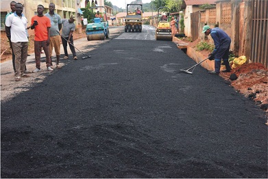 Ongoing asphalt overlay of the Ijapo extension road network embarked upon by the Akeredolu-led administration in Akure... yesterday                                                                                                                           Photo: Peter Oluwadare