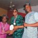 From left: Head of Circulation, Owena Press Limited, Mr Ayokunle Awe, receiving an Award as Patron of NYCN on behalf of Chairman/Editor-in-Chief of the Company, Sir Ademola Adetula, from Mrs Femi Ayodele Rachael who represented Secretary to the State Government, Princess Oladunni Odu and Chairman of the Council, Mr Mathew Ogunmolawa at the event                                              Photo: Ayodele Suberu