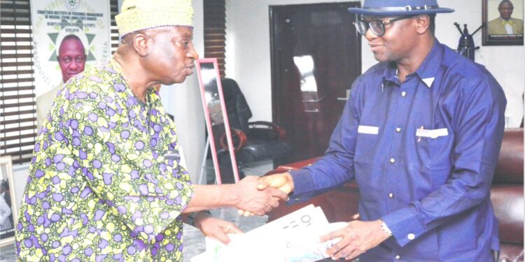 From left: Chairman/Editor-in-Chief of Owena Press Limited, Sir Ademola Adetula, MFR, presenting copies of The Hope to Ondo State Head of Service (HoS), Pastor Kayode Ogundele, during a visit of the Company's Management team to his office in Akure …yesterday                                                                                          Photo: Peter  Oluwadare