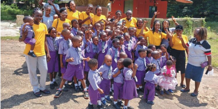 Staff and pupils of the school at the Idanre hill during the excursion